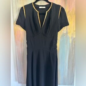 Prada dress Fits size 4-6 black with gold trim